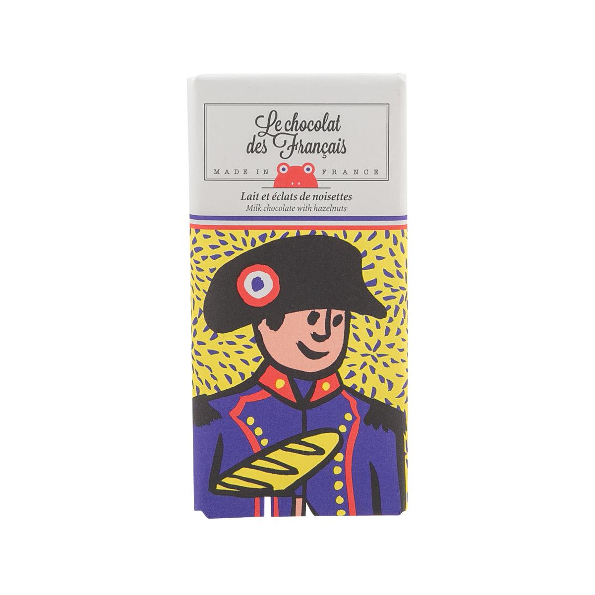 Organic milk chocolate bar with hazelnuts in illustrated carton front