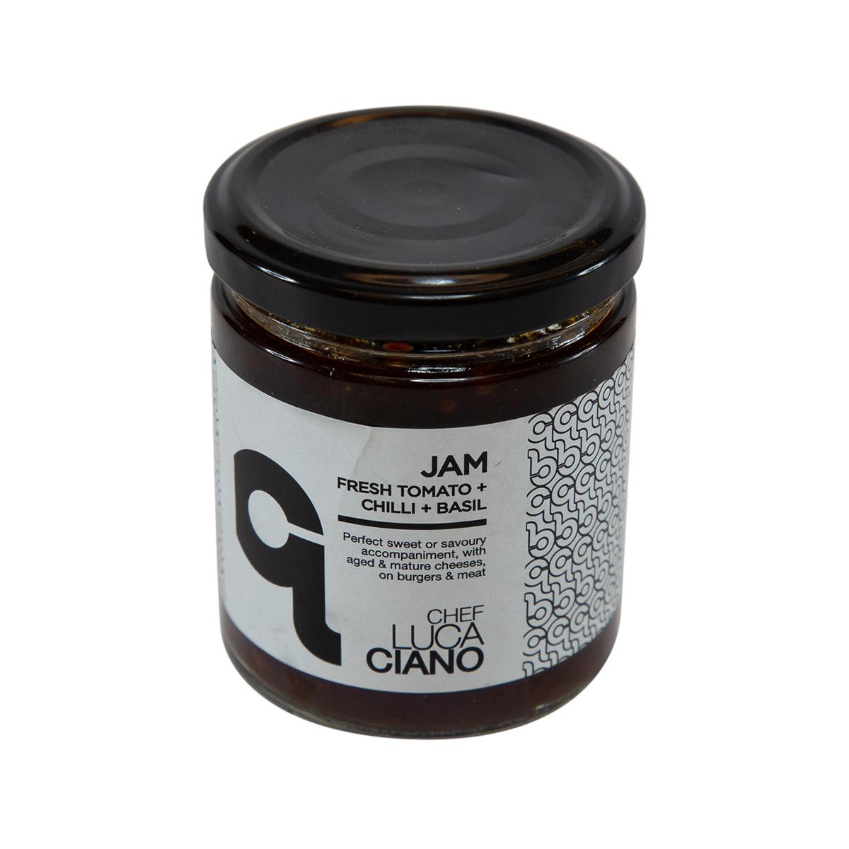 Tomato chili basil jam jar with black lid, front label angled view