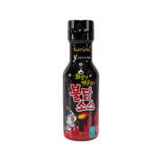 Hot spicy chicken sauce bottle, black cap with red and black front label