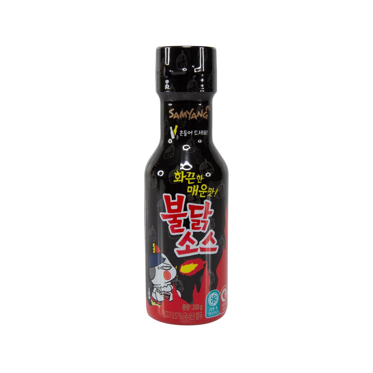 Hot spicy chicken sauce bottle, black cap with red and black front label