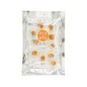 Cheese scallop snack pieces in sealed clear bag