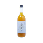 Mikan juice bottle with orange liquid and blue-and-white label