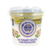 Strained pistachio yogurt in clear-lid plastic cup