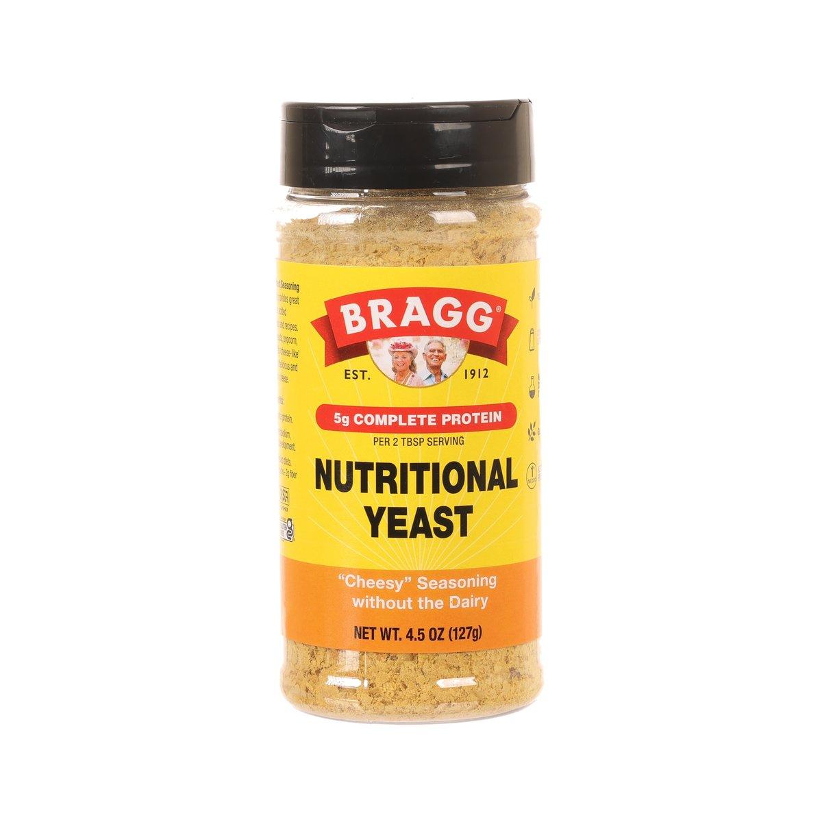 BRAGG nutritional yeast seasoning bottle, dark cap, yellow label, net wt 127g