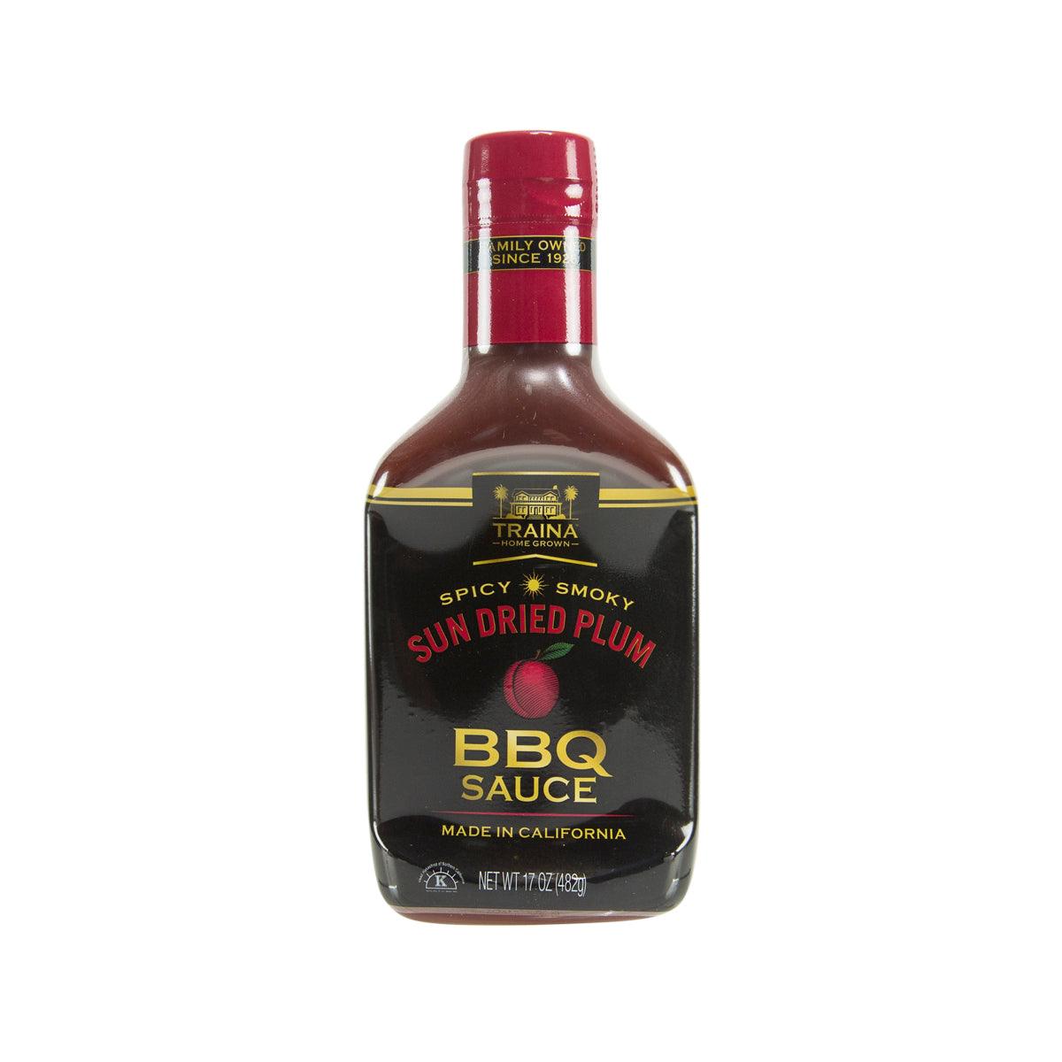 Sun dried plum BBQ sauce bottle with red cap, front label facing up