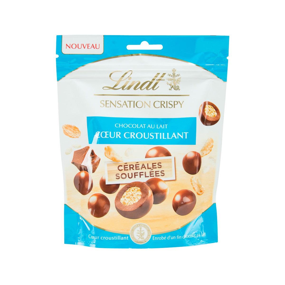 Chocolate cereal puff pouch with milk chocolate balls, LINDT Sensation Crispy