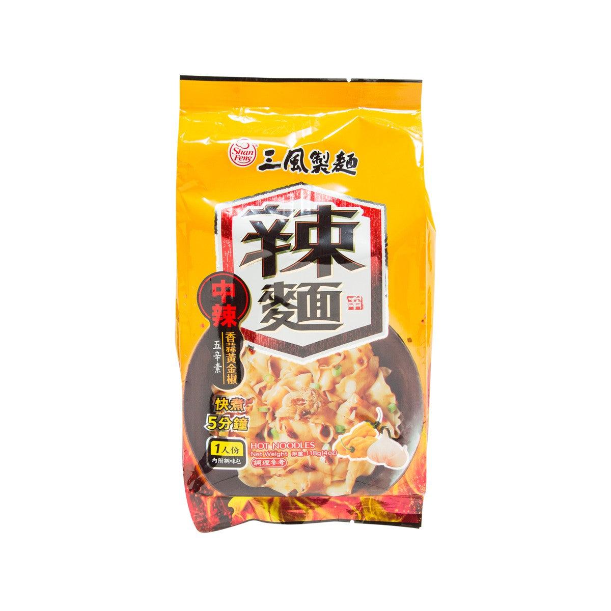 Instant hot noodles packet, yellow with bold black Chinese label