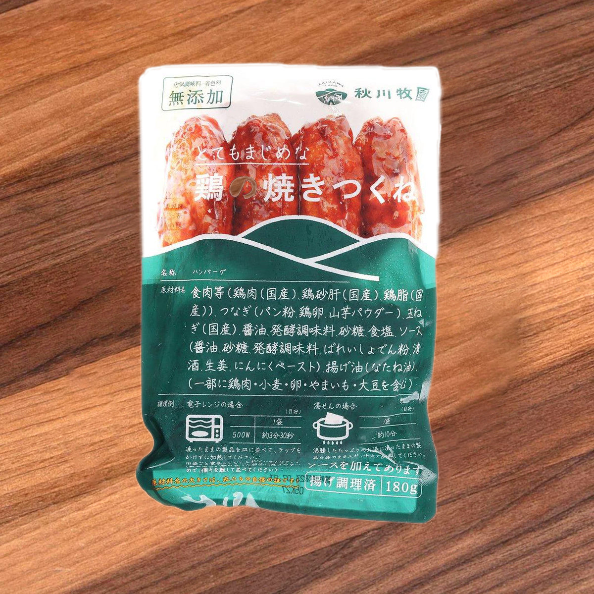 Tsukune chicken stick pouch with red grilled stick photo and Japanese label text