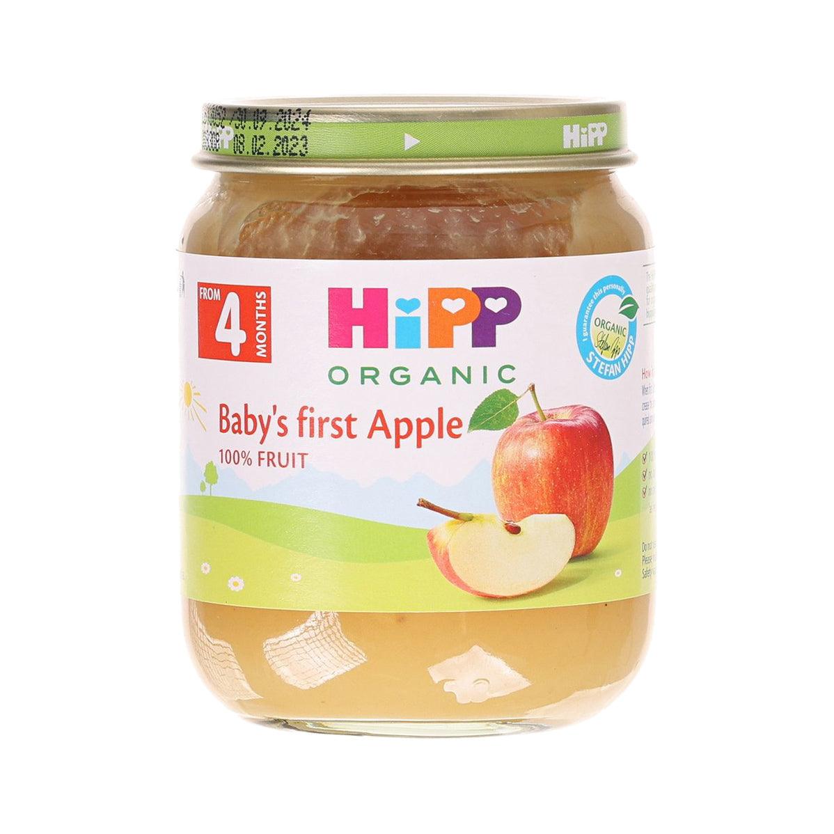 Organic baby apple fruit puree jar with green lid, front label visible