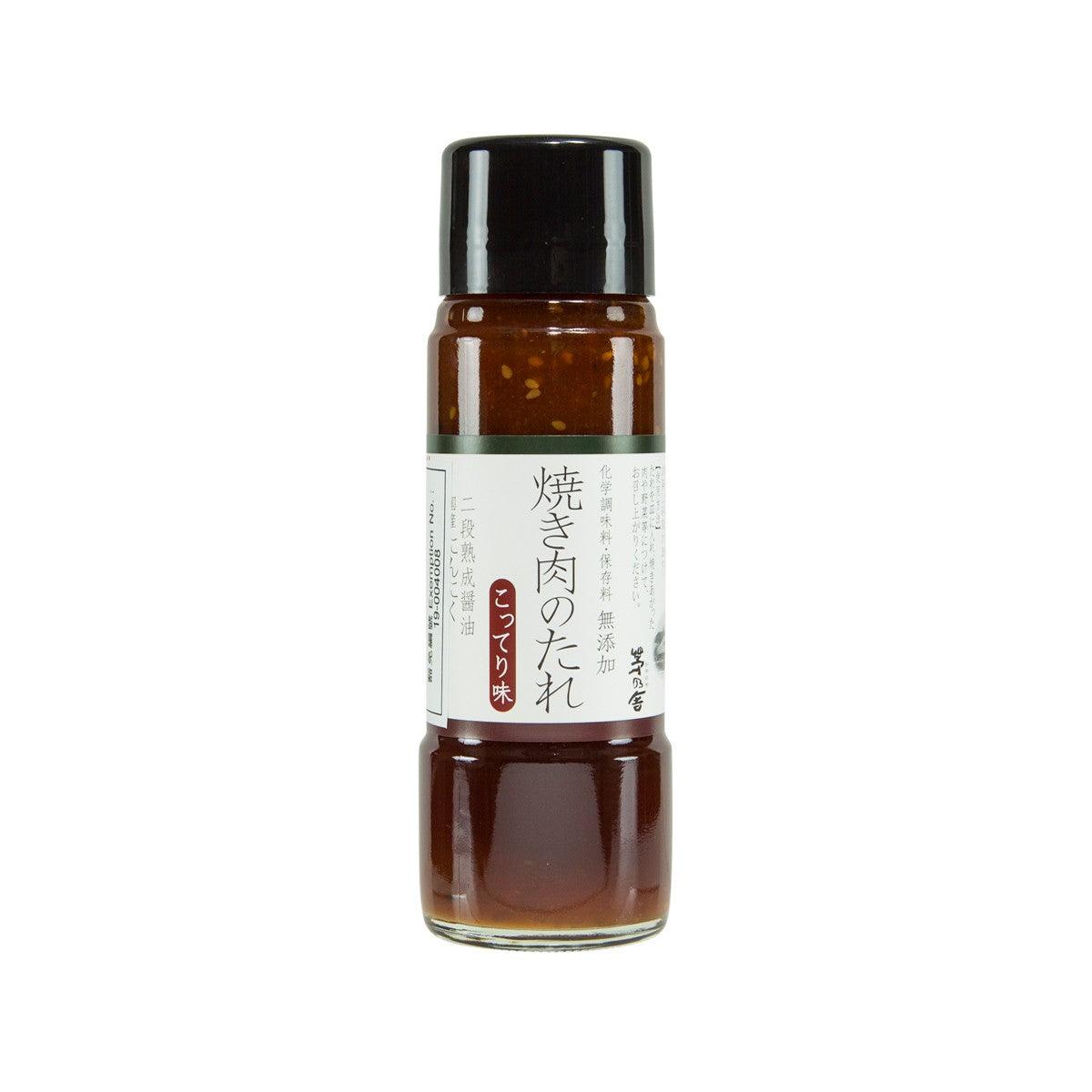Barbecue sauce bottle, brown glass with black cap and front label