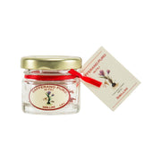 Glass jar of ZAFFERANO pure saffron threads with gold lid and red ribbon seal
