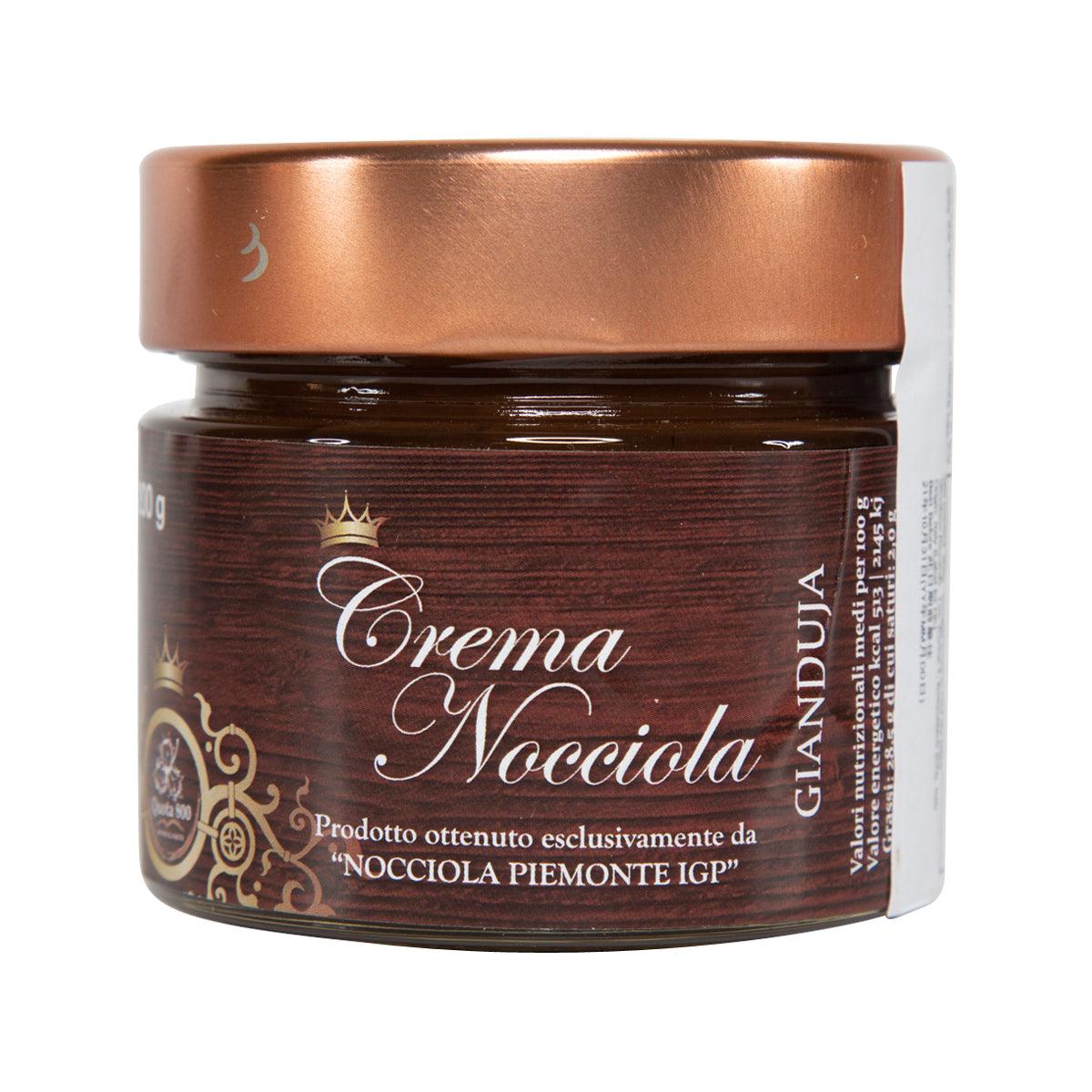 Hazelnut cream jar with copper lid, dark brown label reading Crema Nocciola