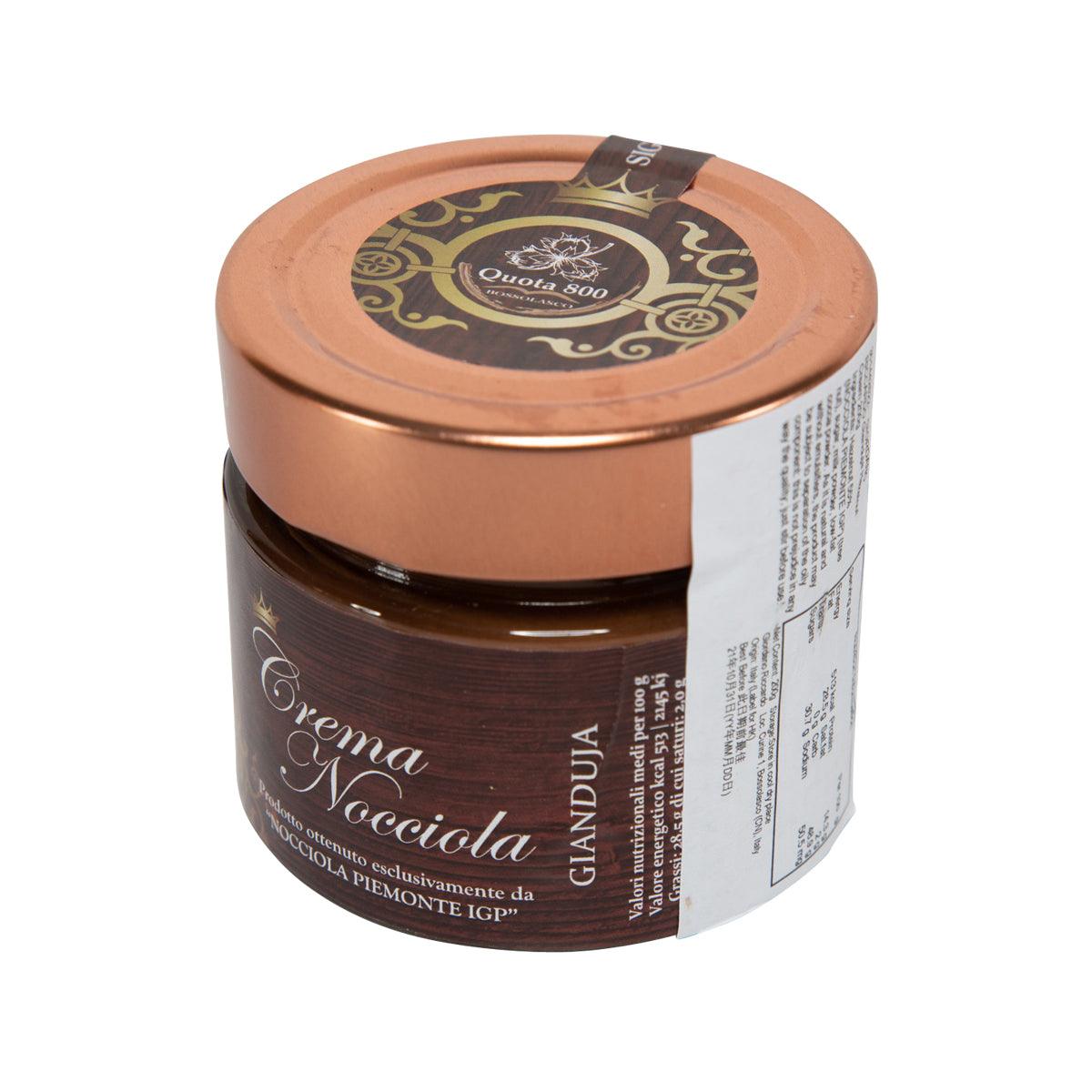 Hazelnut cream jar side view with copper lid and dark brown label
