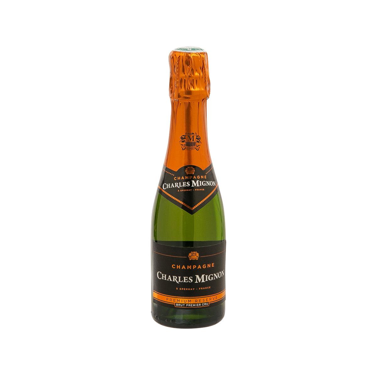 Champagne bottle Charles MIGNON Brut NV, amber foil top and label