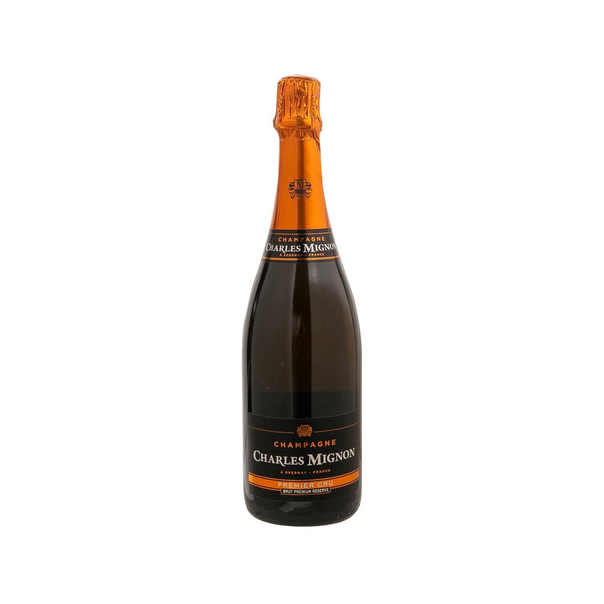 CHARLES MIGNON brut champagne bottle with orange foil top and front label