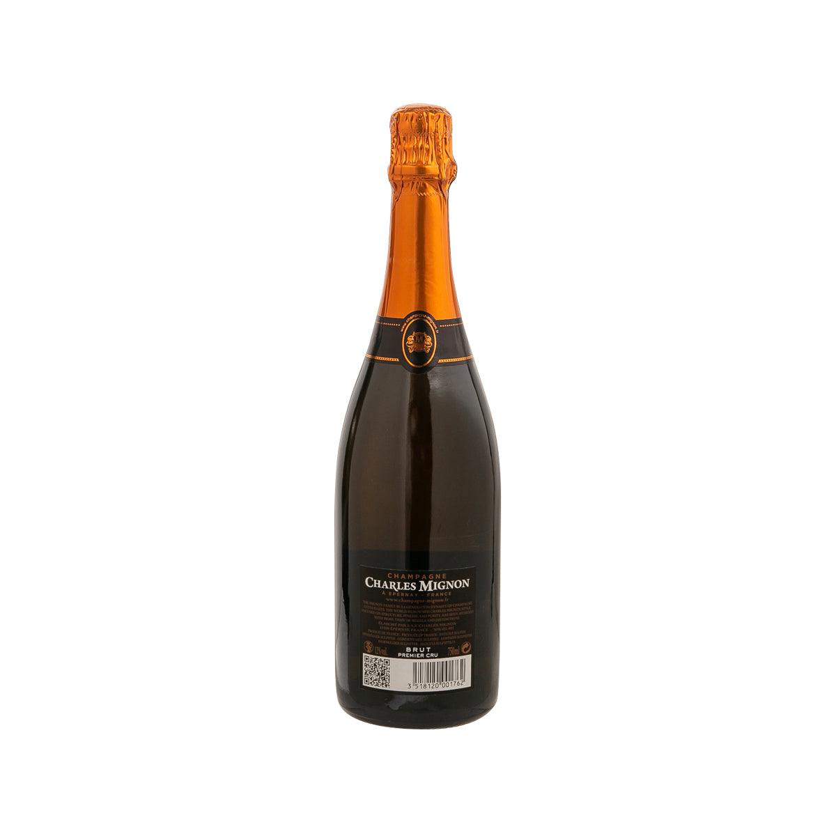 CHARLES MIGNON brut champagne bottle with orange foil top and barcode back label