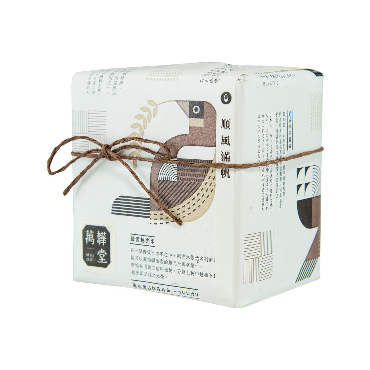 500g koshihikari rice bag, side view with printed details and twine