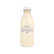 DAYLESFORD Organic cultured buttermilk bottle, 500 mL, cream color.