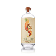 SEEDLIP Grove 42 non-alcoholic spirits bottle with fruit label and brown cap