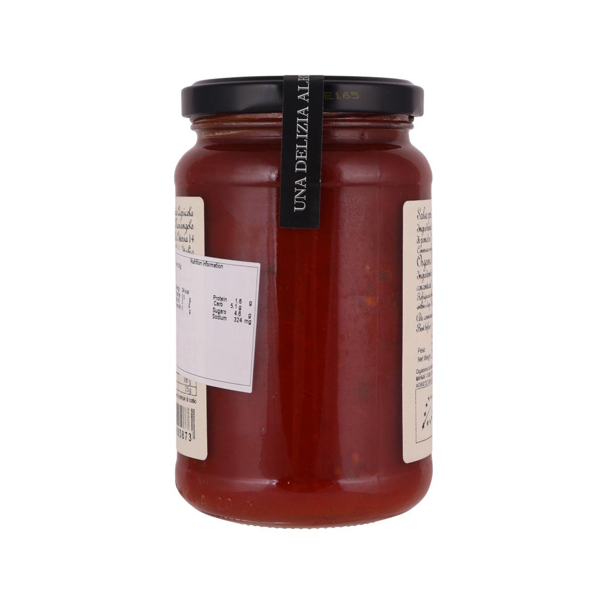 Organic pizza sauce jar with black lid, back label on red sauce