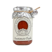 Tomato and apple pasta sauce jar with silver foil lid and cream front label