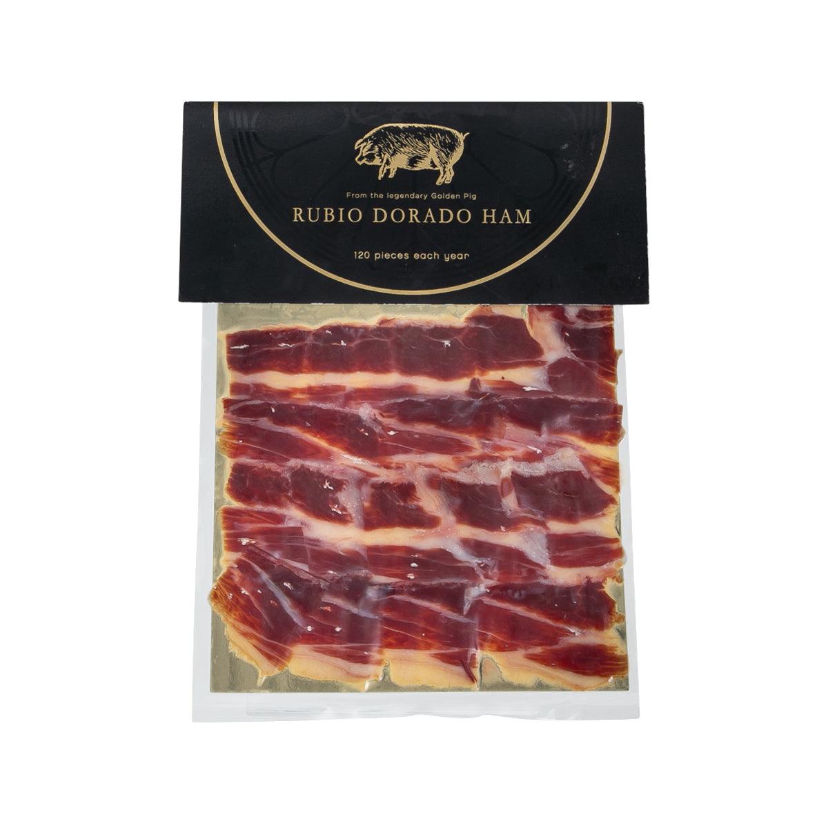 Hand-sliced Rubio Dorado shoulder ham slices in clear pack, bone-in