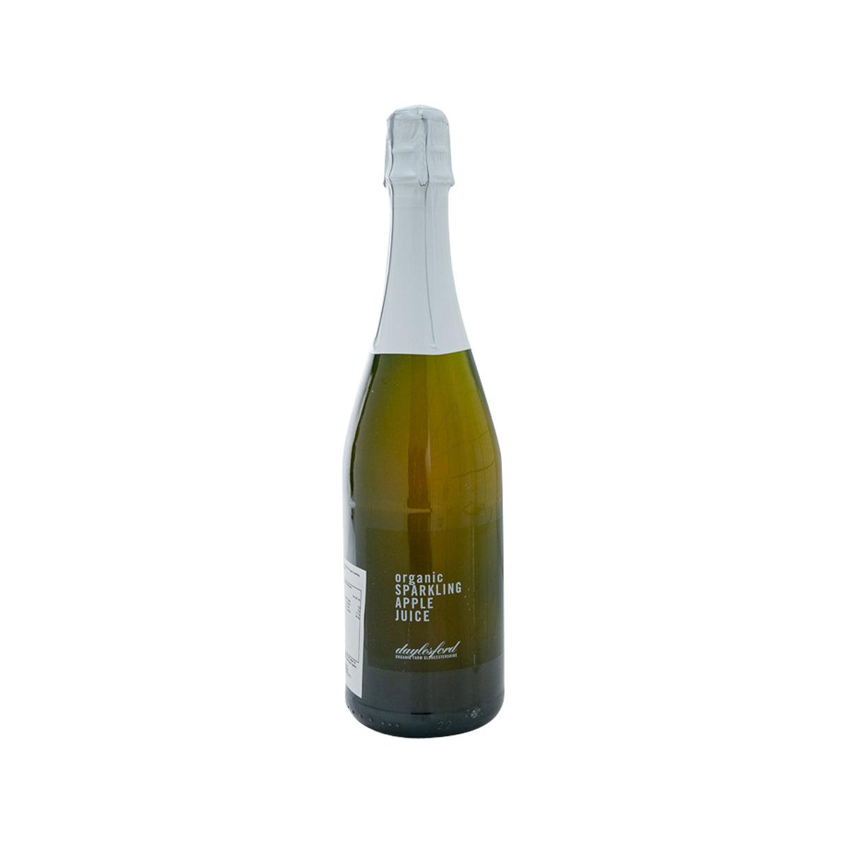 DAYLESFORD sparkling apple juice bottle, clear glass, silver foil cap, organic label