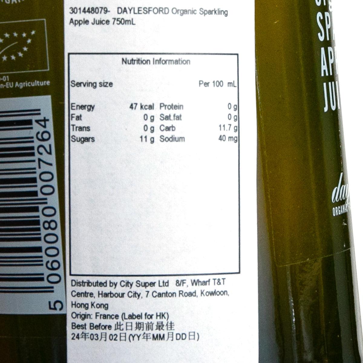 Sparkling apple juice bottle label close-up with barcode and nutrition information