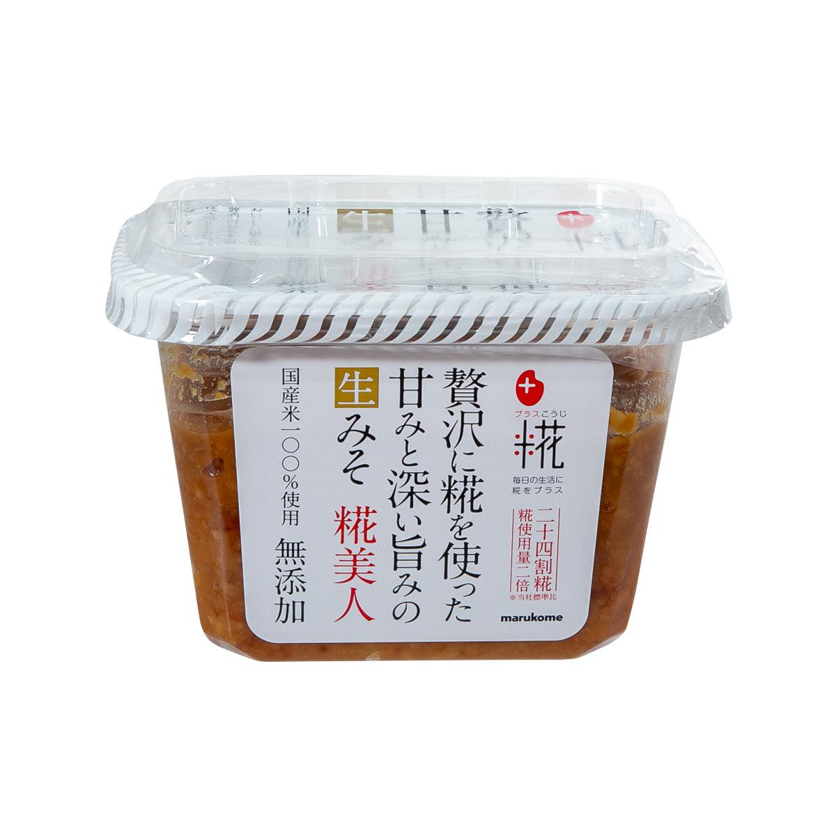 Miso paste jar with clear lid, brown contents, and front label with Japanese text