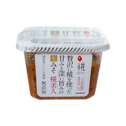 Miso paste jar with clear lid, brown contents, and front label with Japanese text