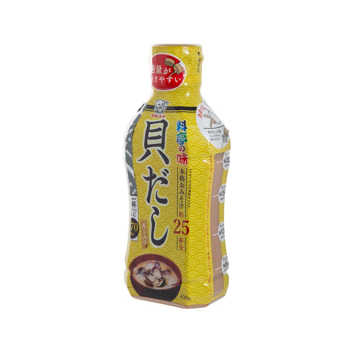 Liquid miso clam stock bottle, front view with yellow label and red cap