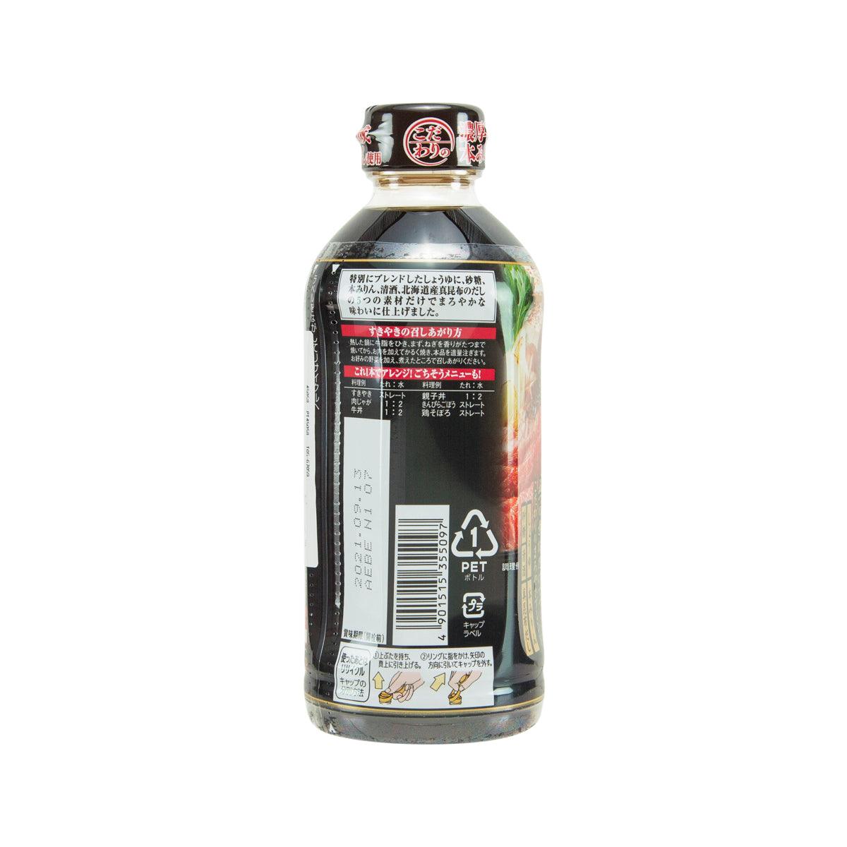 KIKKOMAN seasoning sauce bottle with back label, barcode area, and sealed cap