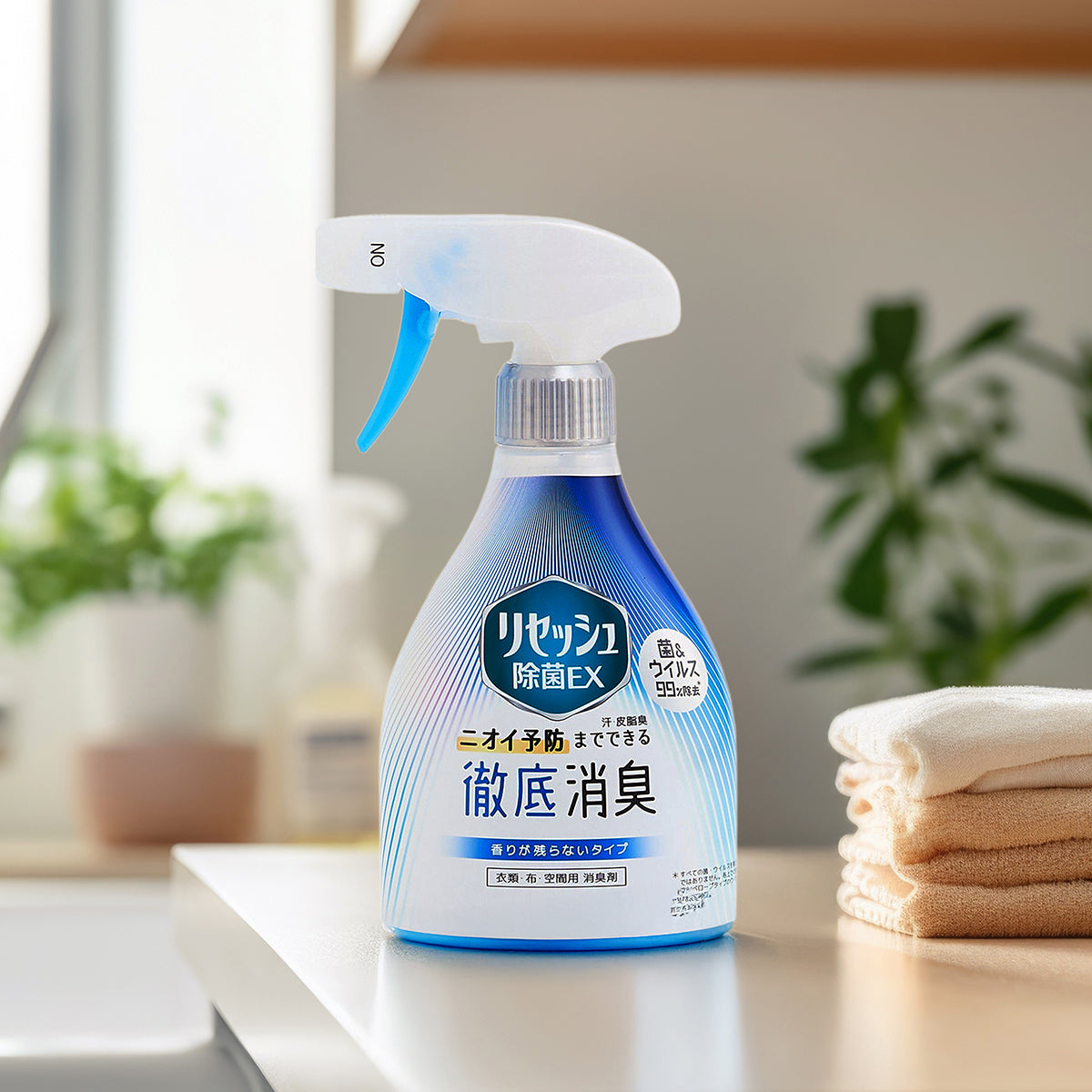 Fabric antibacterial spray bottle with blue label and white spray trigger