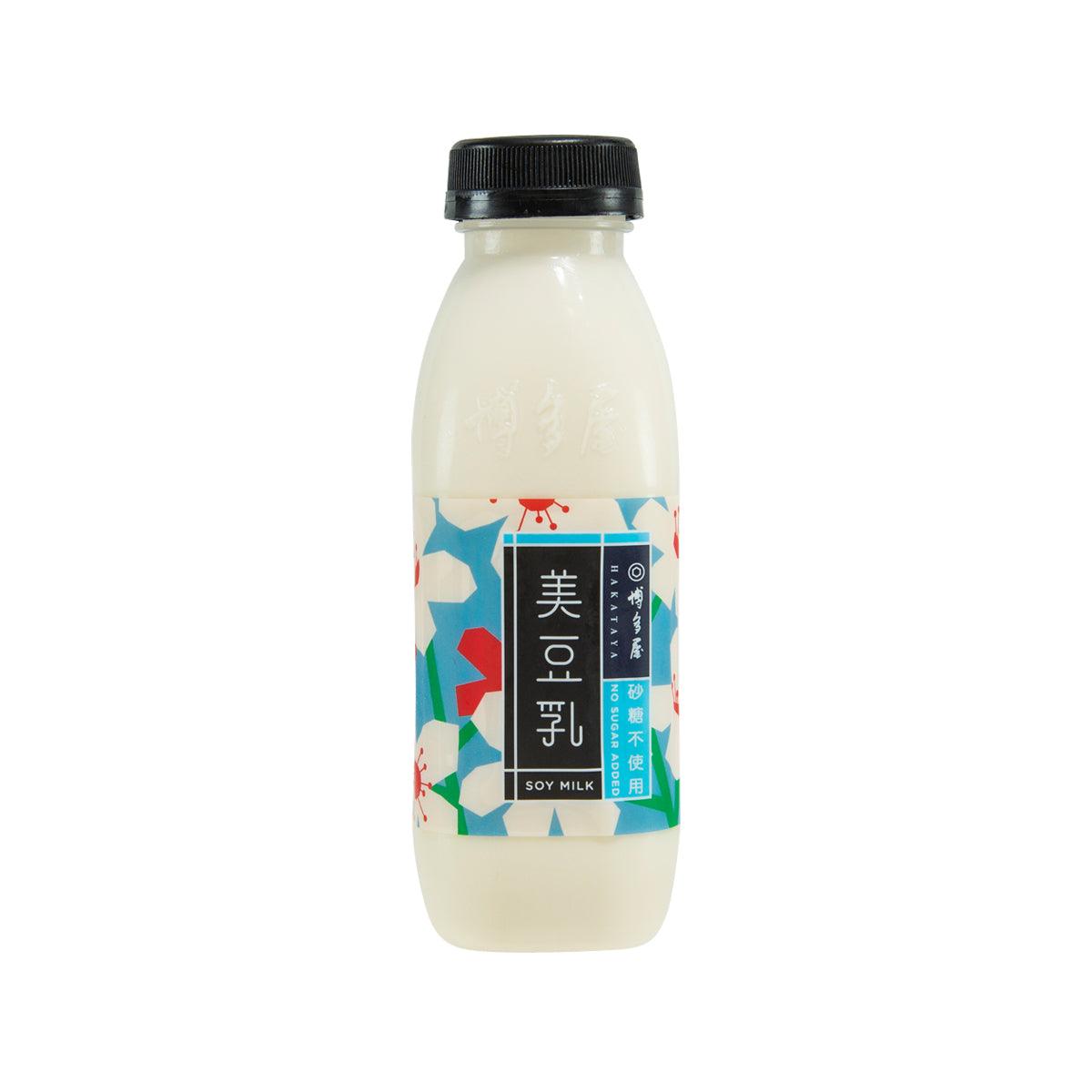 No sugar added soymilk bottle, clear plastic with black cap and white liquid
