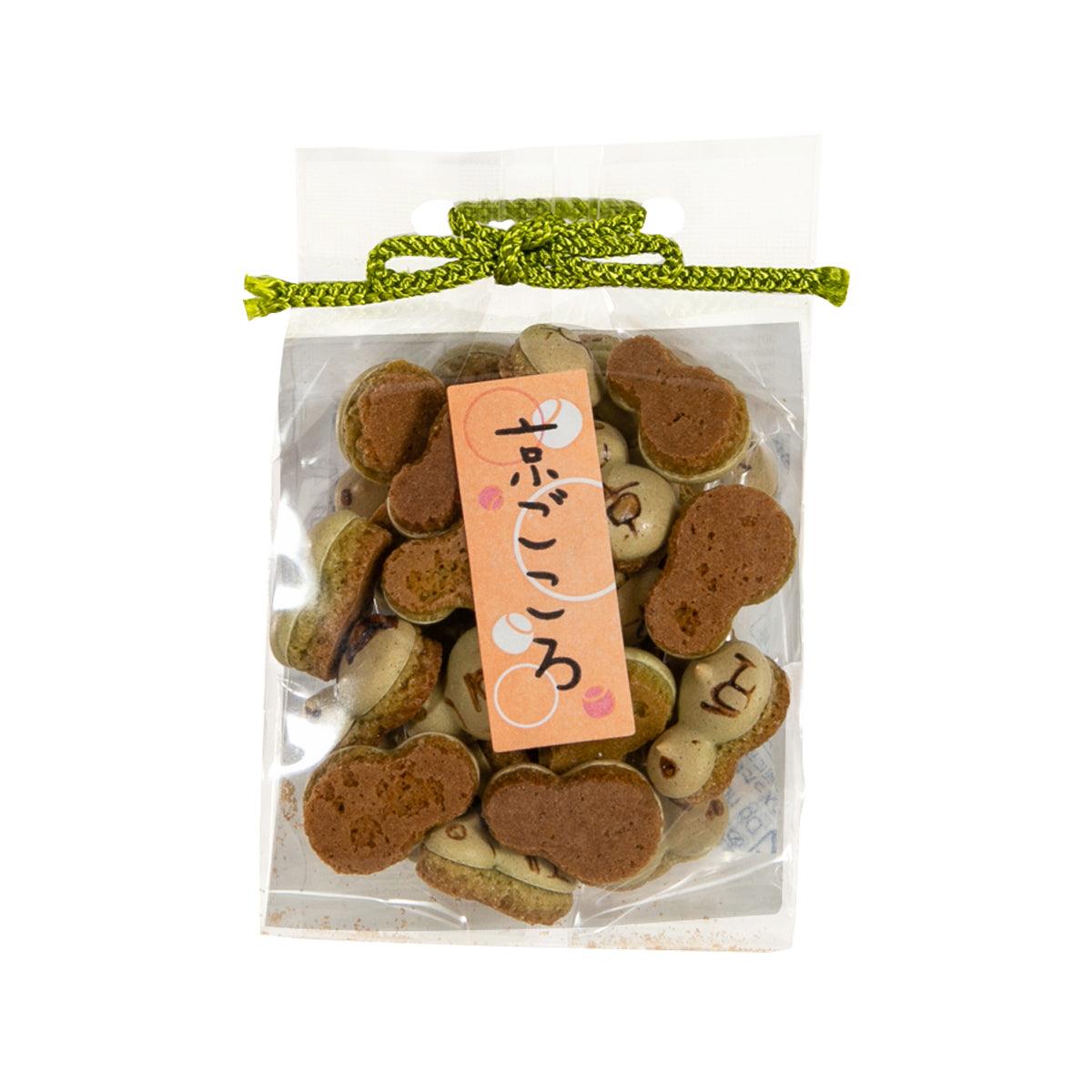Matcha bolo cookie bag with round brown cookies and green tied ribbon