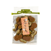 Matcha bolo cookie bag with round brown cookies and green tied ribbon