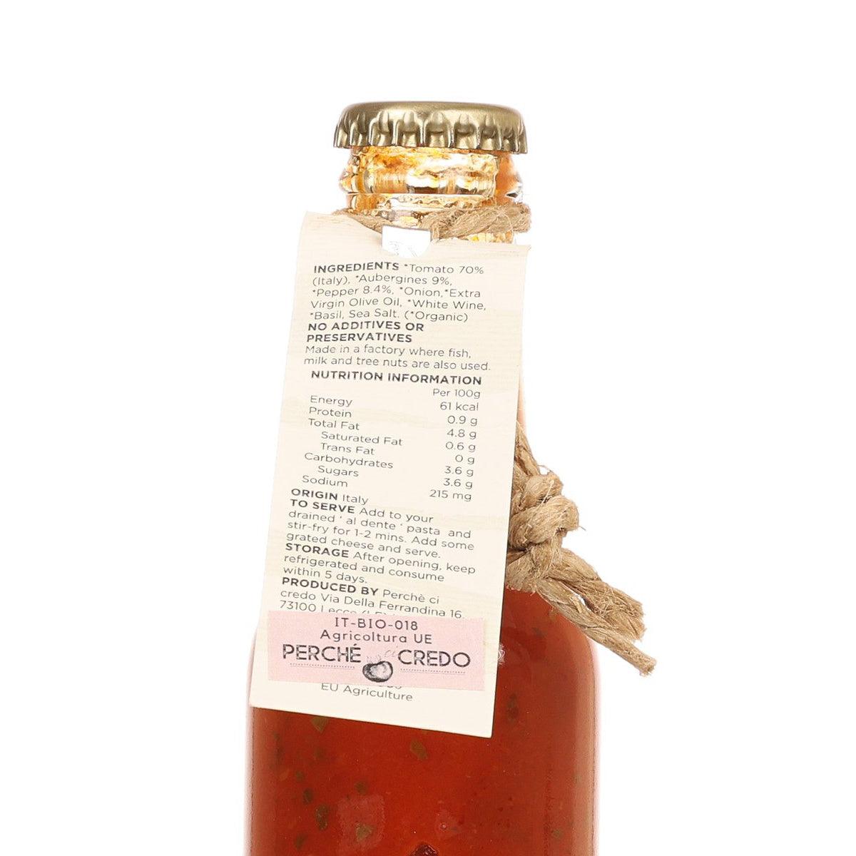 Organic tomato sauce bottle, tied paper label with ingredient and nutrition text.