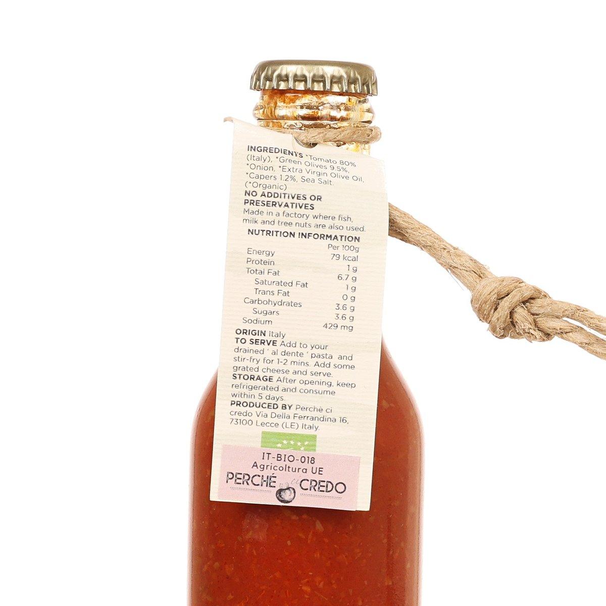 Organic tomato sauce bottle with ingredient and storage label and twine handle