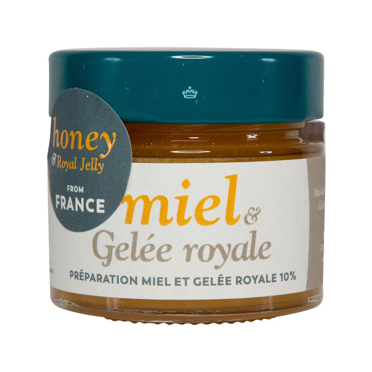 Honey and royal jelly jar with teal lid and amber honey filling