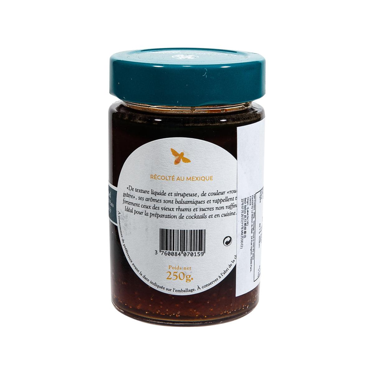 Avocado blossom flower honey jar with teal lid and back label text
