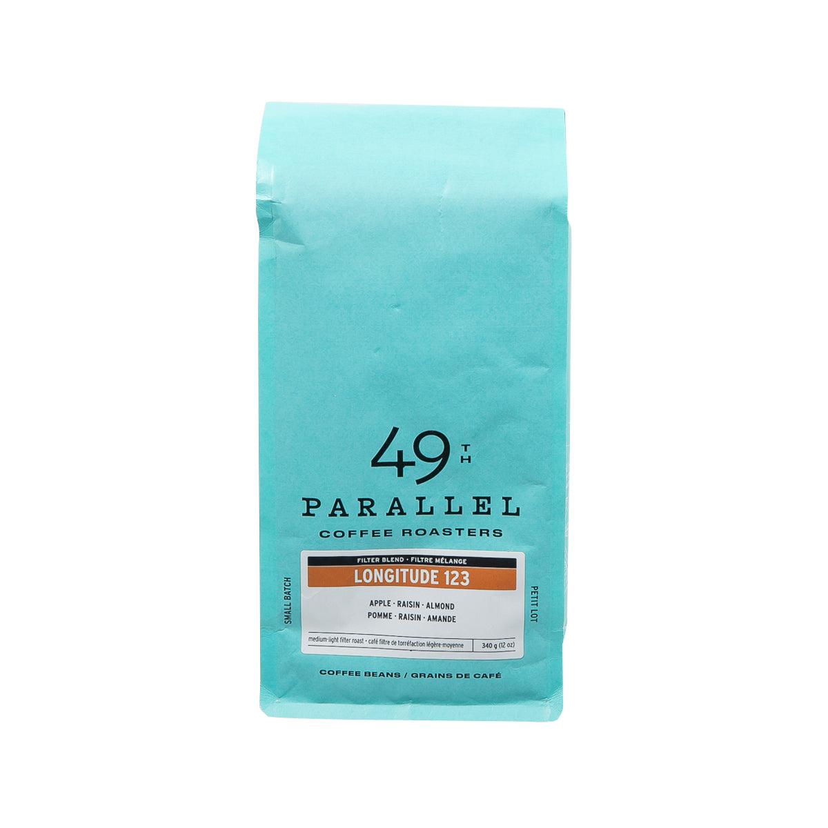 Medium-light roast coffee bean pouch, teal bag with Longitude 123 front label