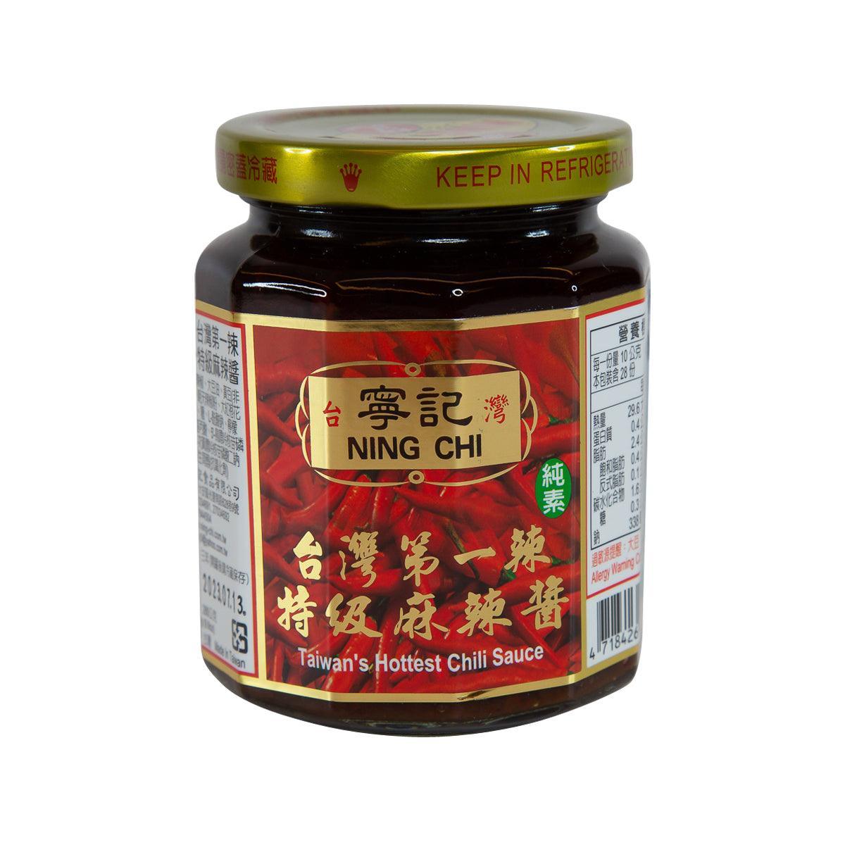 Chili sauce jar with dark red sauce, green lid, front label