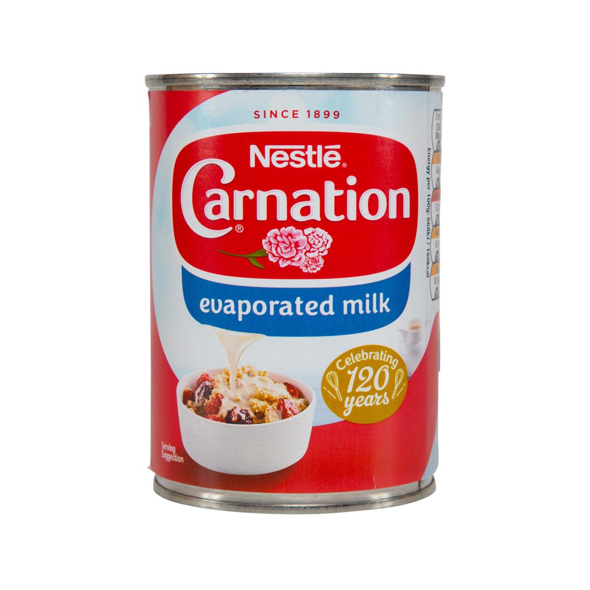 Nestle Carnation evaporated milk can, red and white label, 410g