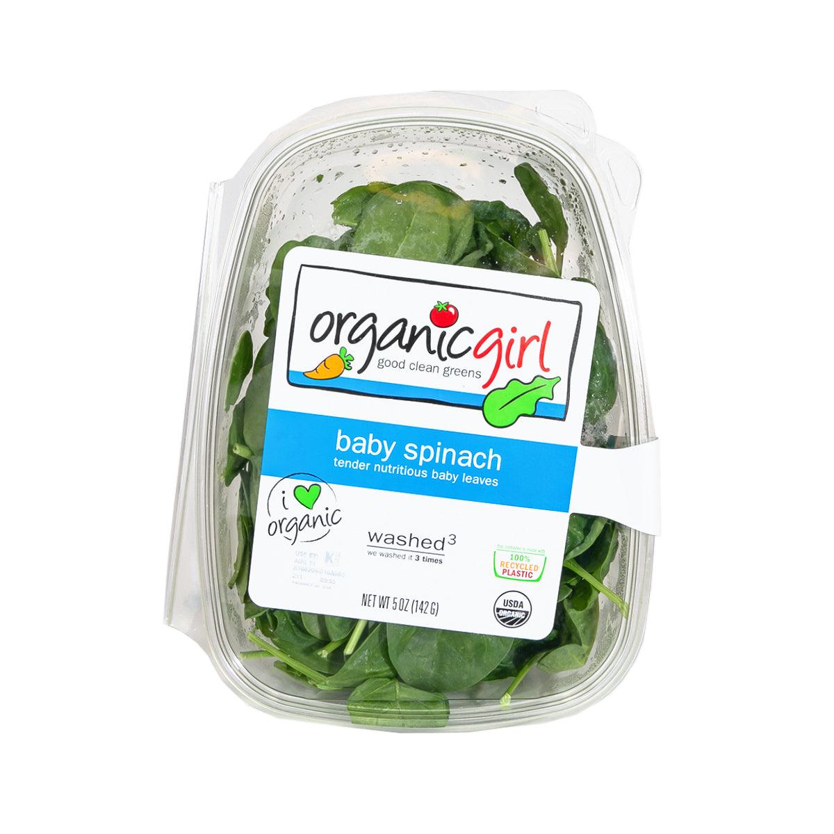 Organic baby spinach in clear plastic clamshell with printed label