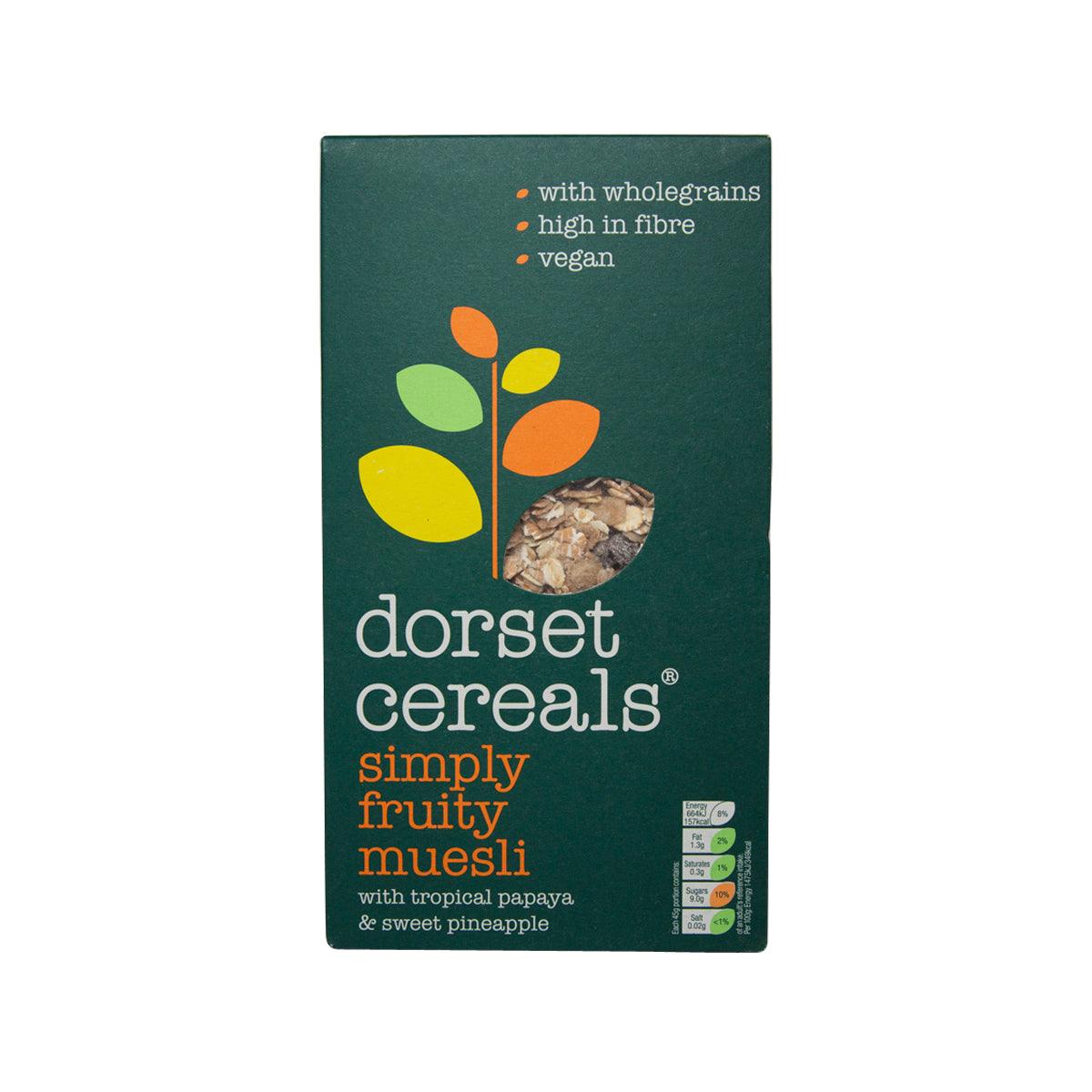 Dorset Simply Fruity Muesli cereal box, dark green with fruit logo and front label