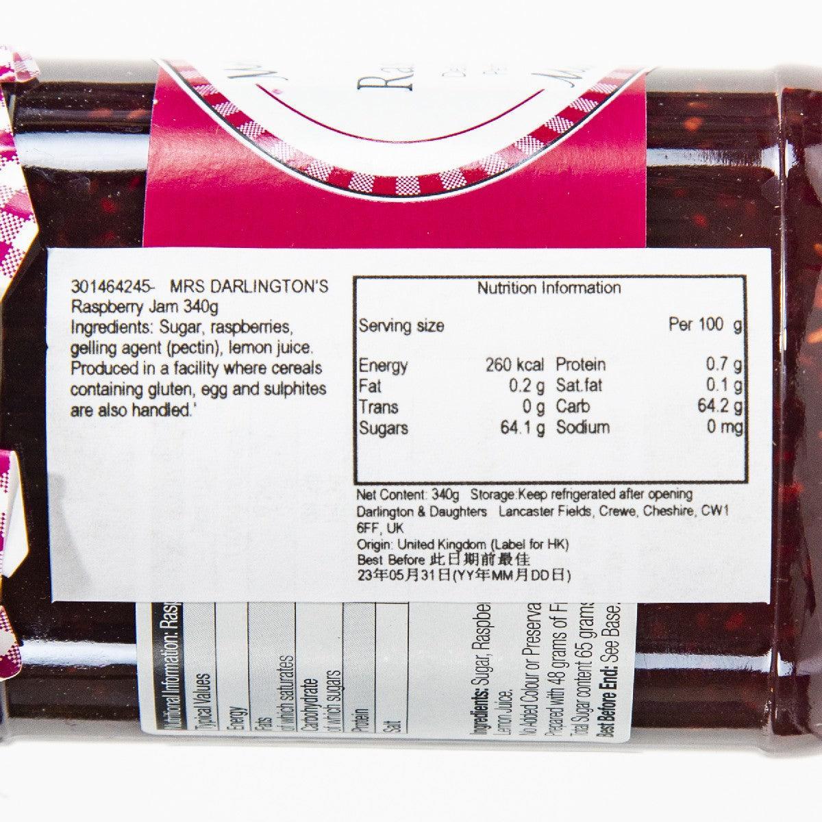 Raspberry extra jam jar label close-up with nutrition information