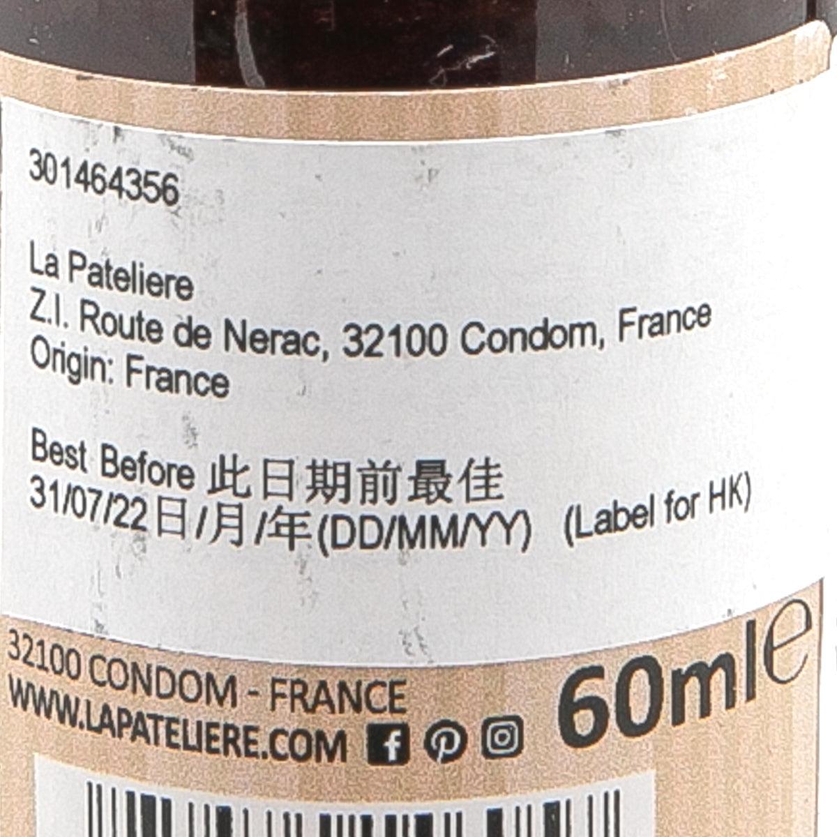 LA PATELIERE strawberry extract bottle label close-up with address and 60 mL