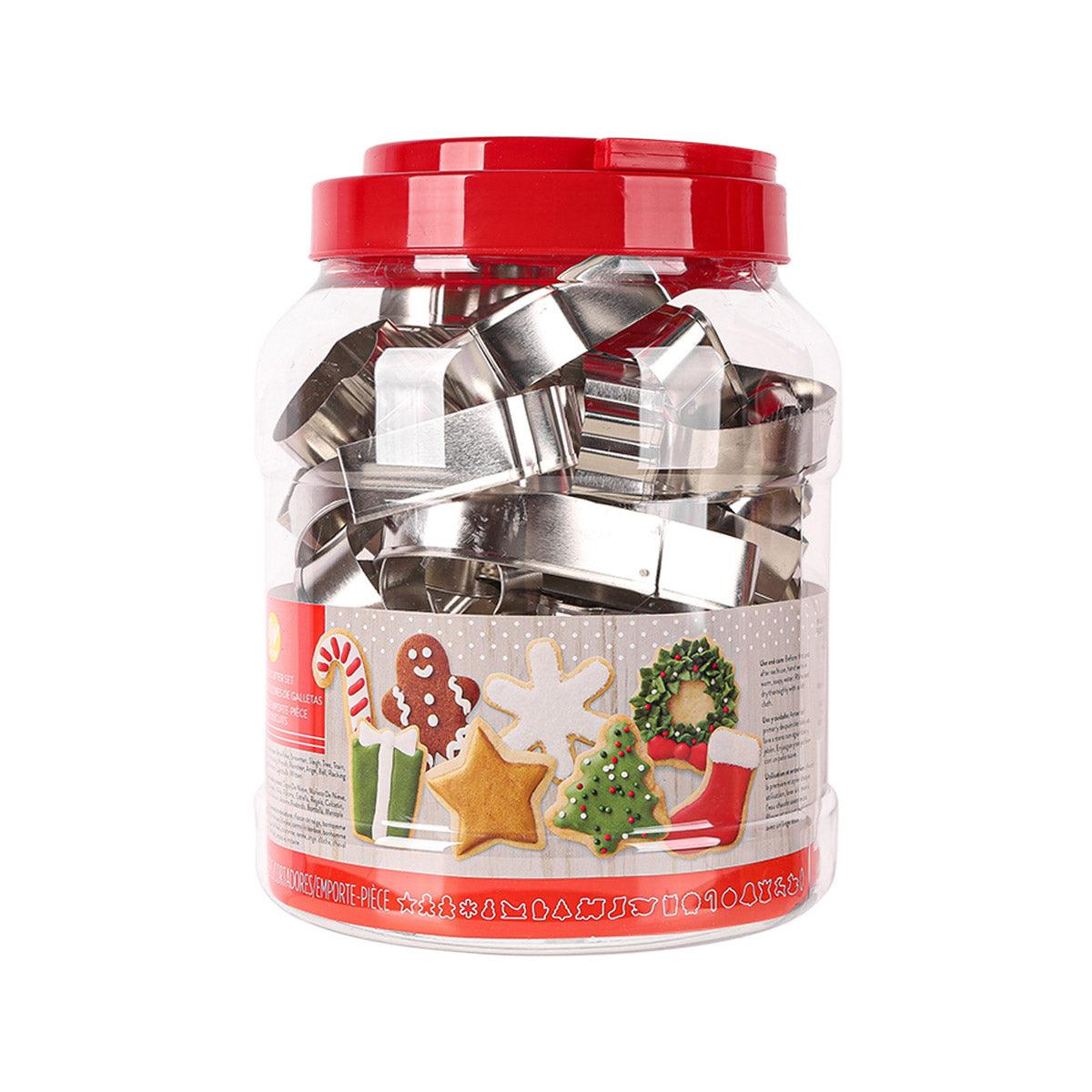 Christmas cookie cutter set in clear jar with red lid, assorted metal festive shapes