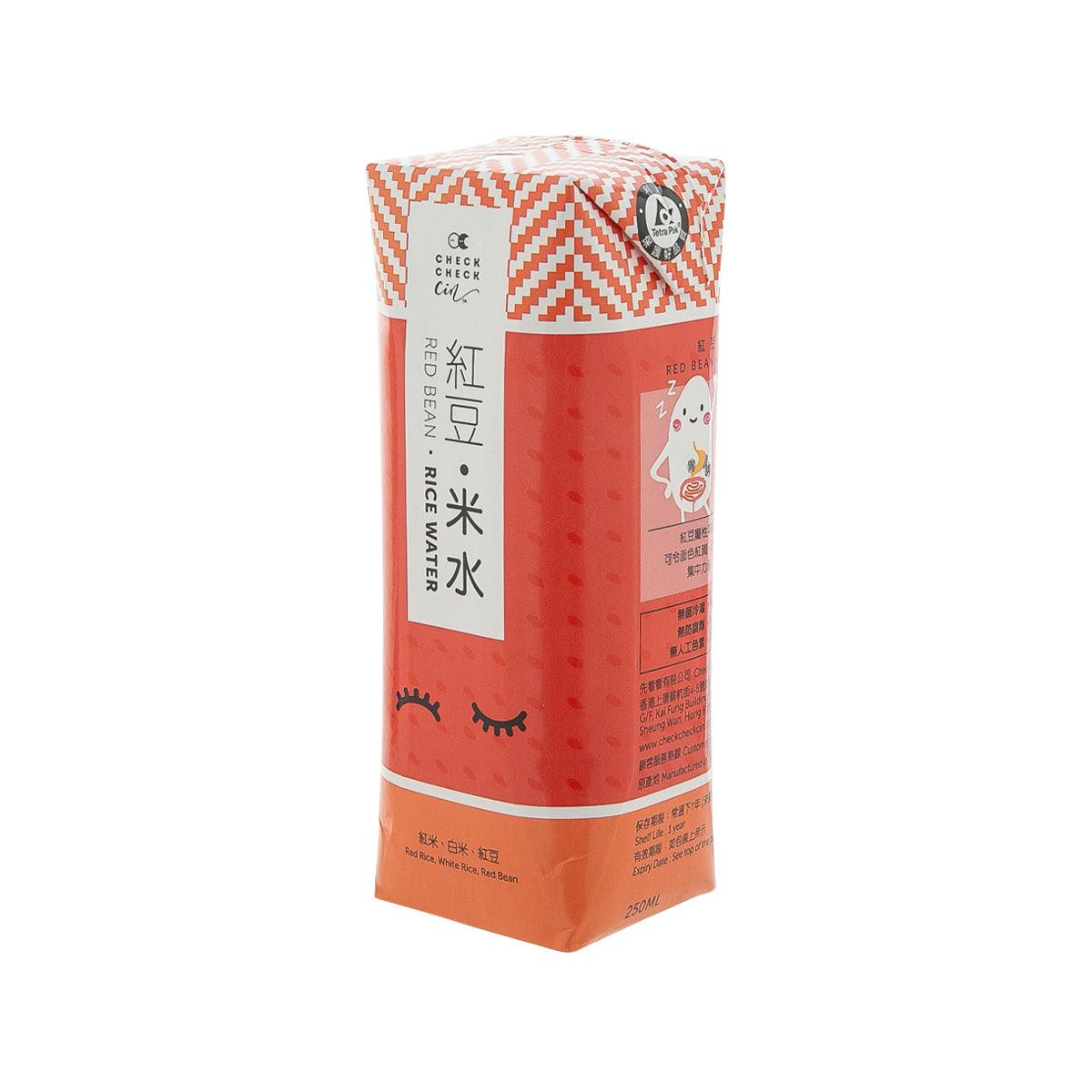 Red-orange rice water carton with label panels and small animal graphics