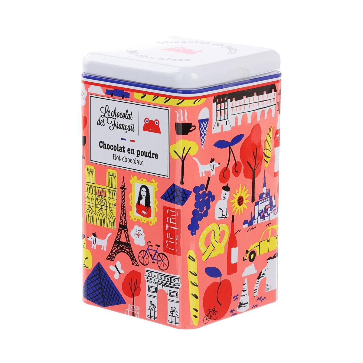 Red illustrated hot chocolate powder tin, side view, blue-lidded